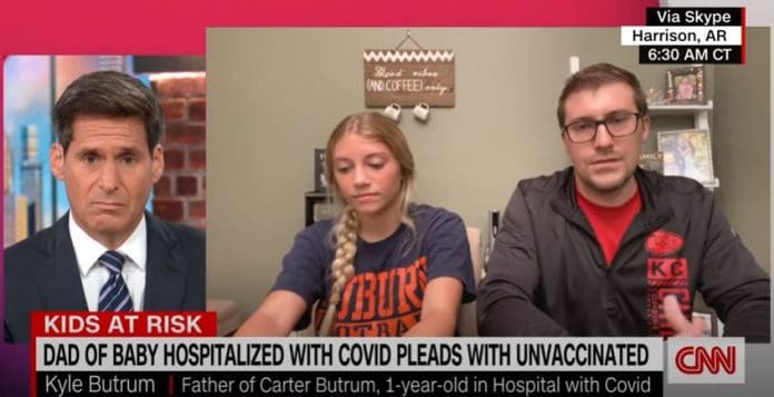 Father of infant hospitalized by Covid-19 has CNN anchor fighting back tears